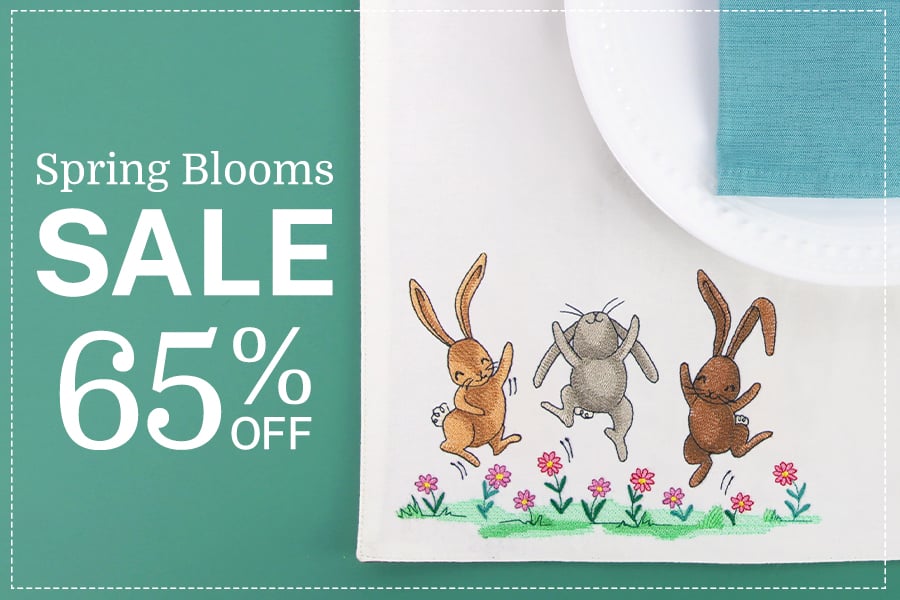 65% off spring blooms sale - image features bunnies on placemat