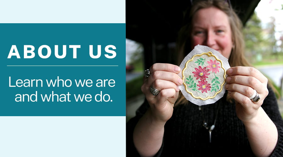 About Us - Learn who we are and what we do - employee holding lace
