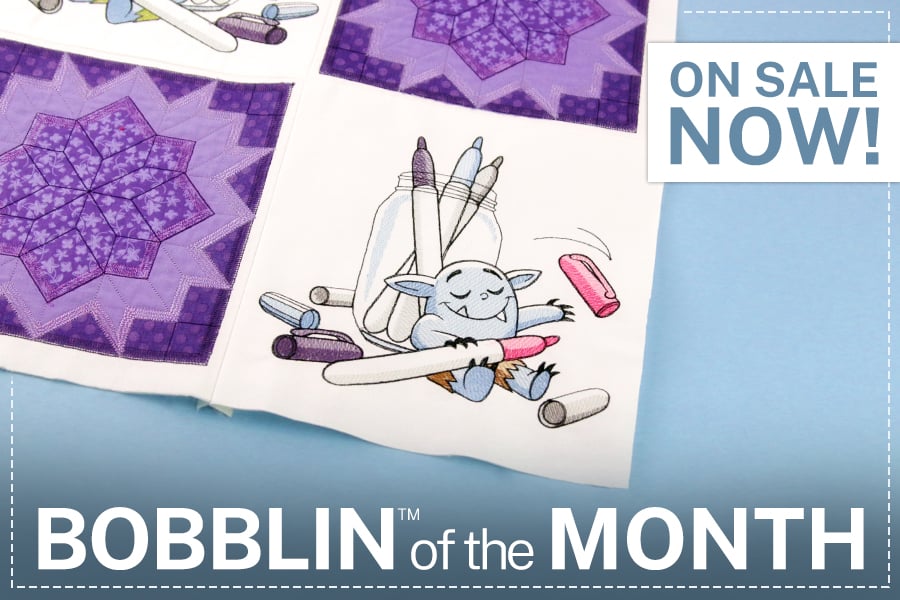 Bobblin™ of the Month - on sale now - Bobblin™ holding a marker 