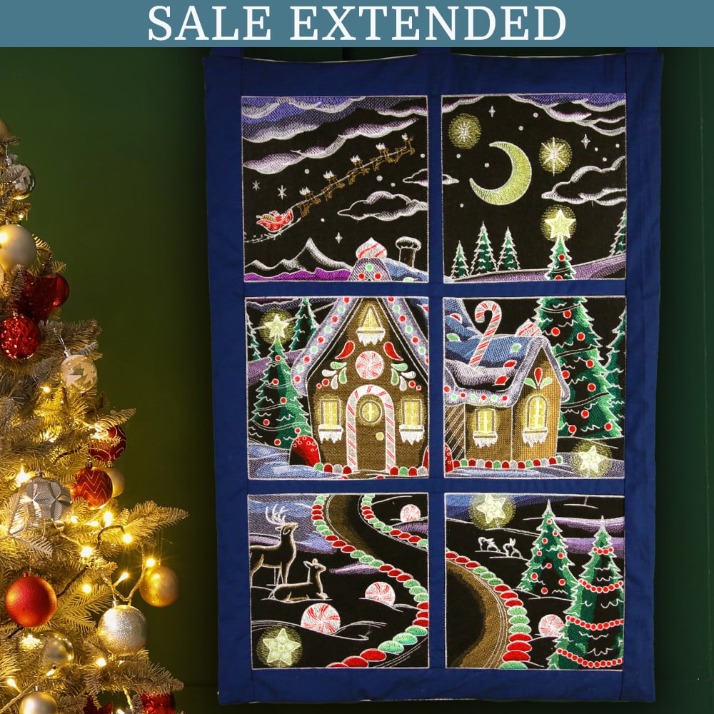 Sale Extended - 50% off - image features: Gingerbread scene on wall hanging next to Christmas tree decorated with ornaments